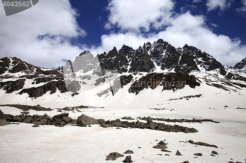 Image of Snowy mountain at wind day