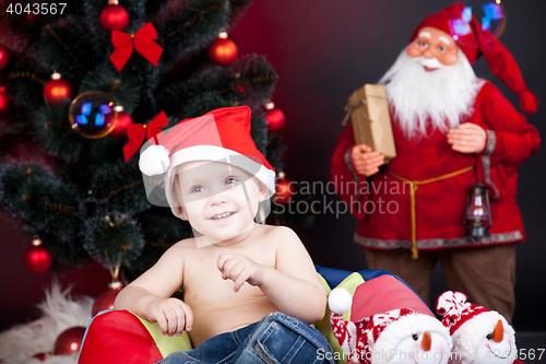 Image of child with xmas decoration