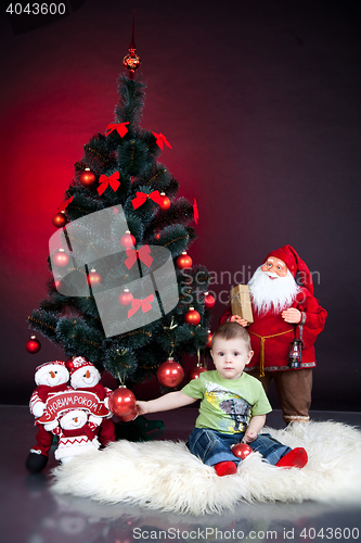 Image of child with xmas decoration
