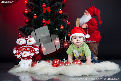 Image of child with xmas decoration