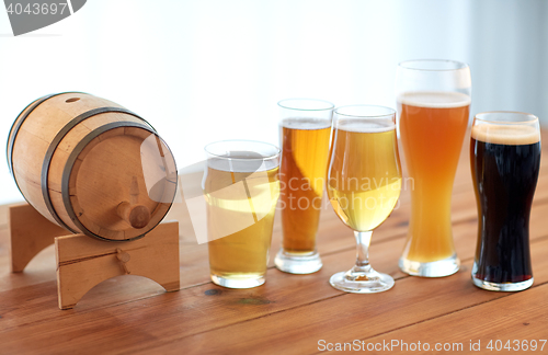 Image of close up of different beers in glasses on table