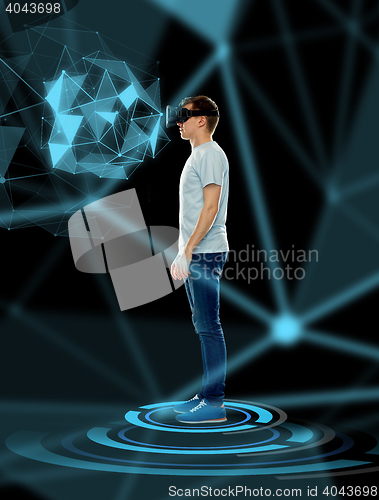 Image of happy man in virtual reality headset or 3d glasses