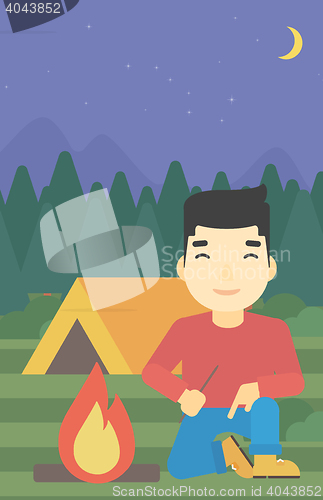 Image of Man kindling campfire vector illustration.