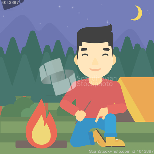 Image of Man kindling campfire vector illustration.