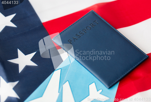 Image of american flag, passport and air tickets