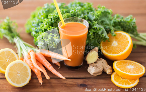 Image of glass of carrot juice, fruits and vegetables