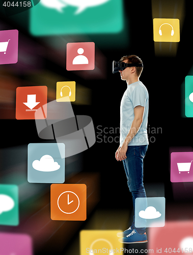 Image of happy man in virtual reality headset or 3d glasses