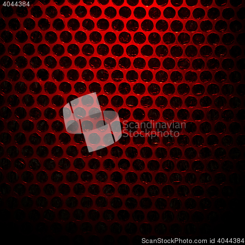 Image of Bubble wrap lit by red light