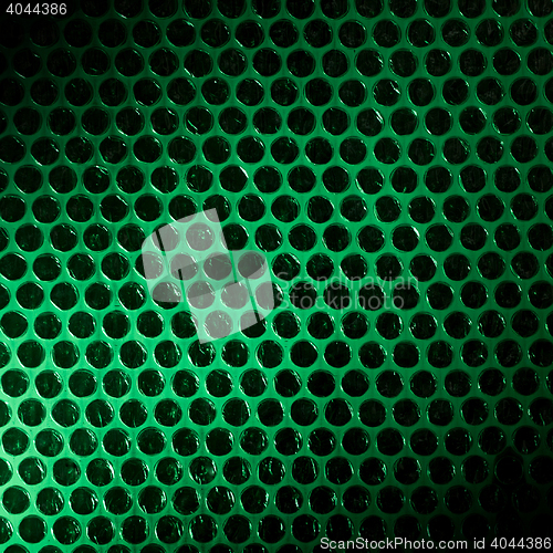 Image of Bubble wrap lit by green light