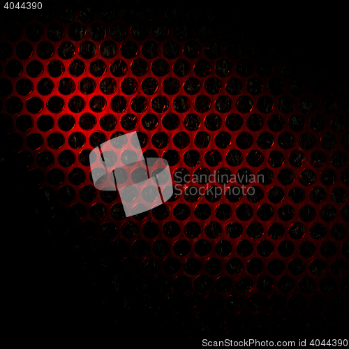 Image of Bubble wrap lit by red light