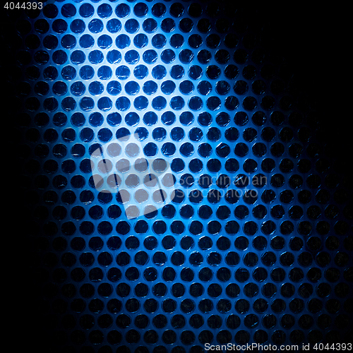 Image of Bubble wrap lit by blue light