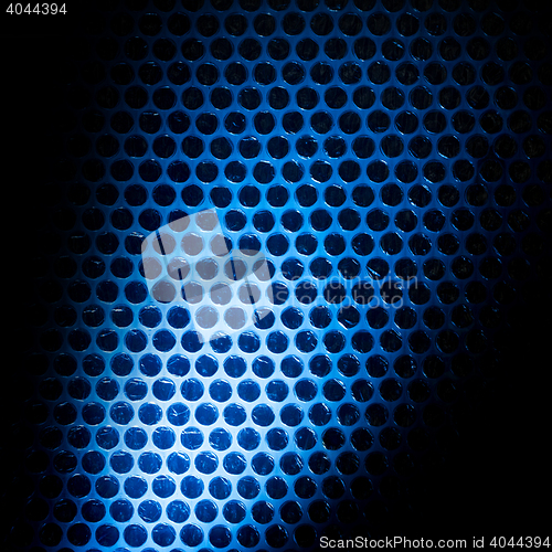 Image of Bubble wrap lit by blue light