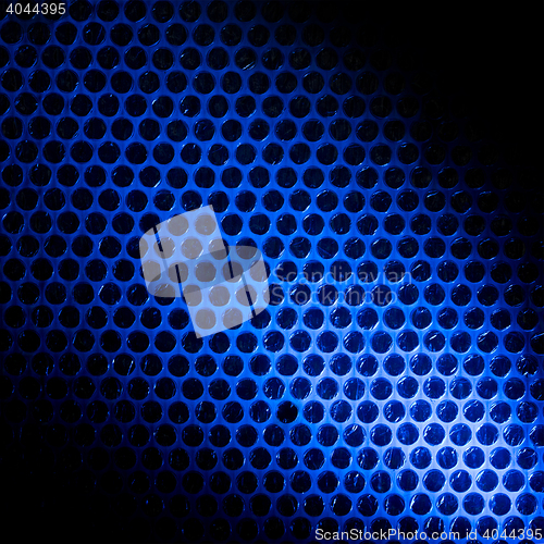 Image of Bubble wrap lit by blue light