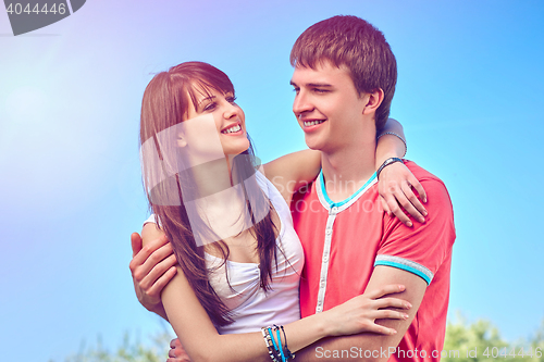 Image of Young couple enjoyingoutdoors