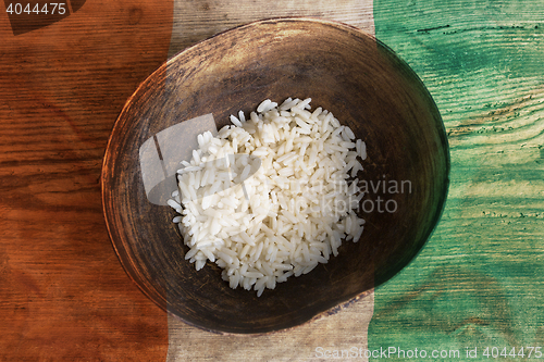 Image of Poverty concept, bowl of rice with Ivory Coast flag      