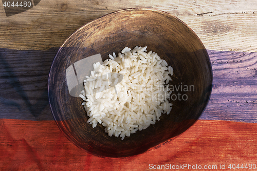 Image of Poverty concept, bowl of rice with Russian flag      