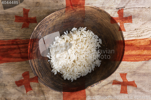 Image of Poverty concept, bowl of rice with Georgia flag      