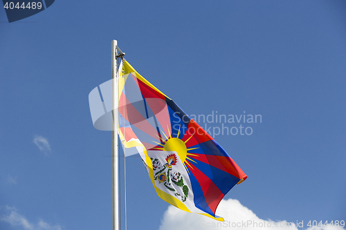 Image of National flag of Tibet on a flagpole