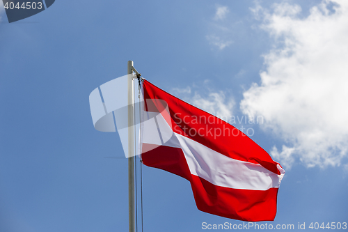 Image of National flag of Austria on a flagpole