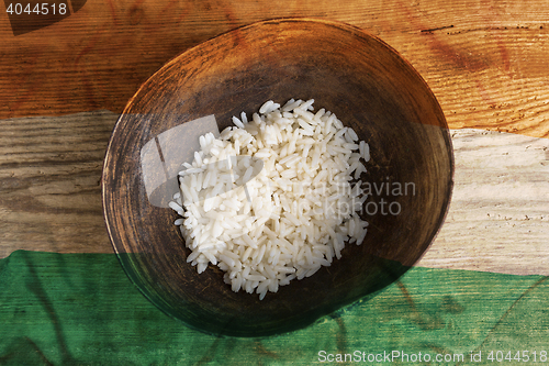 Image of Poverty concept, bowl of rice with Indian flag      