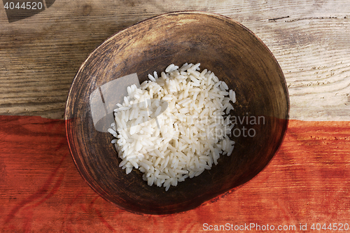 Image of Poverty concept, bowl of rice with Polish flag      