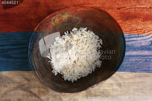 Image of Poverty concept, bowl of rice with Serbian flag      
