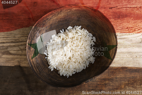 Image of Poverty concept, bowl of rice with Syria flag      