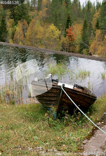 Image of Tarred tethered boat