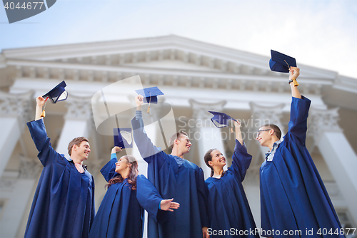 Image of group of smiling students with mortarboards