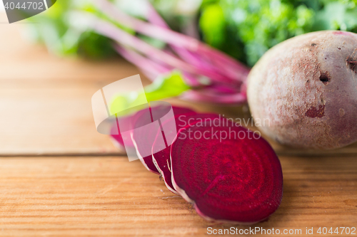 Image of close up of sliced beet on wood