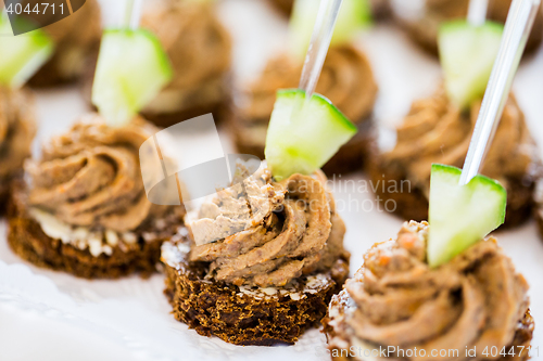 Image of close up of canape with paste on serving tray