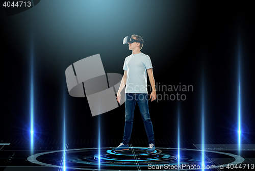 Image of happy man in virtual reality headset or 3d glasses