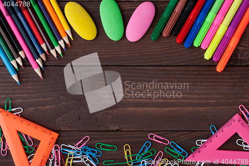 Image of School supplies on a wooden table