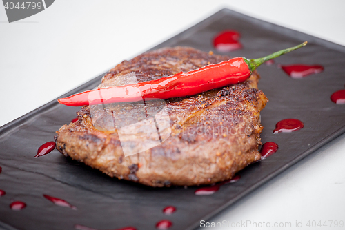 Image of grilled steak with pepper