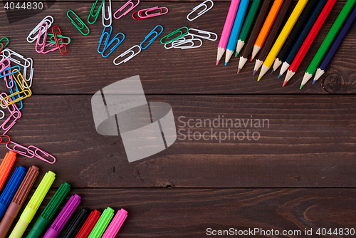 Image of School supplies on a wooden table