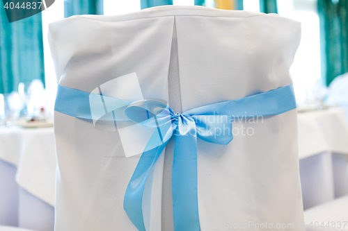 Image of Chair, beautifully decorated with ribbon