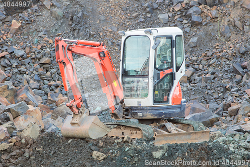 Image of Small orange bulldozer