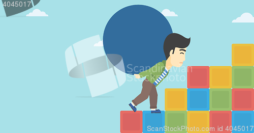 Image of Man carrying concrete ball uphill.