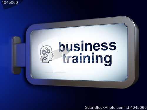 Image of Education concept: Business Training and Head With Gears on billboard background