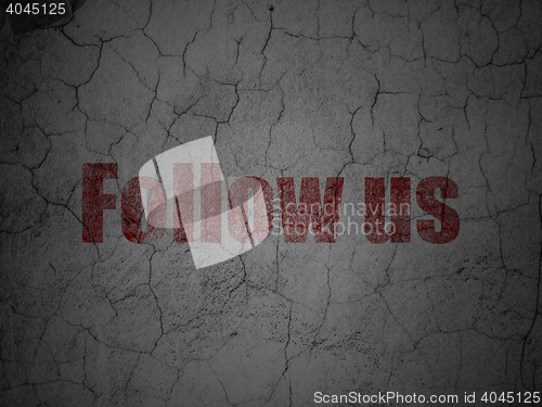 Image of Social network concept: Follow us on grunge wall background
