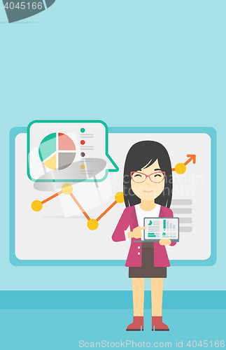 Image of Business woman presenting report on a laptop.