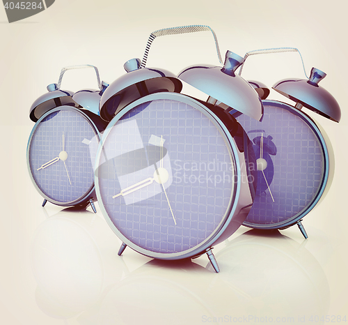 Image of 3d illustration of glossy alarm clocks against white background 