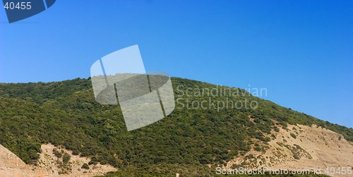 Image of Hills with blue sky on background