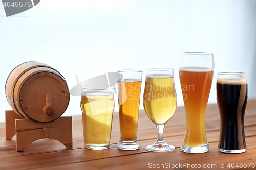 Image of close up of different beers in glasses on table