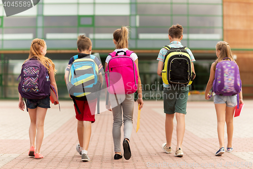 Image of group of happy elementary school students walking