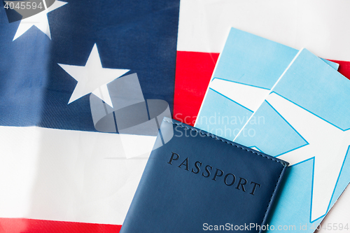 Image of american flag, passport and air tickets