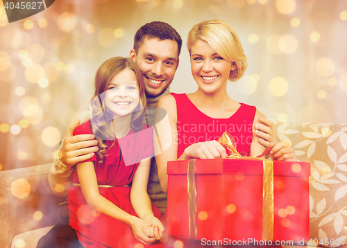 Image of happy family opening gift box