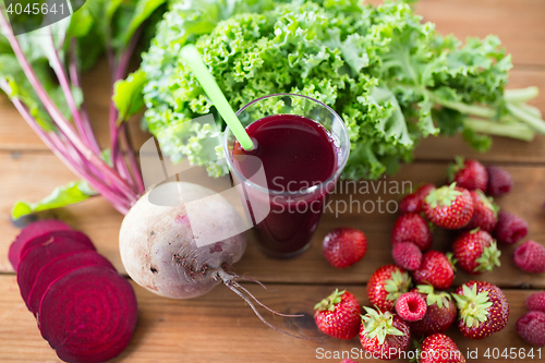 Image of glass of beetroot juice, fruits and vegetables