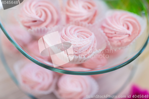 Image of close up of custard sweets on glass serving tray