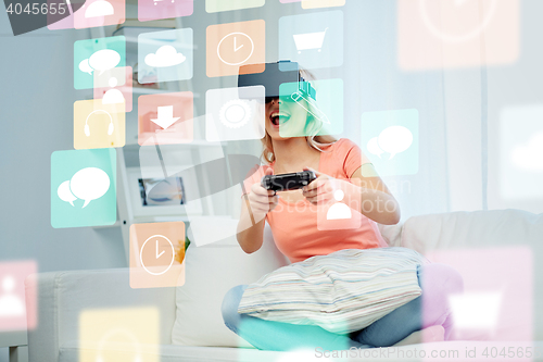 Image of woman in virtual reality headset with controller